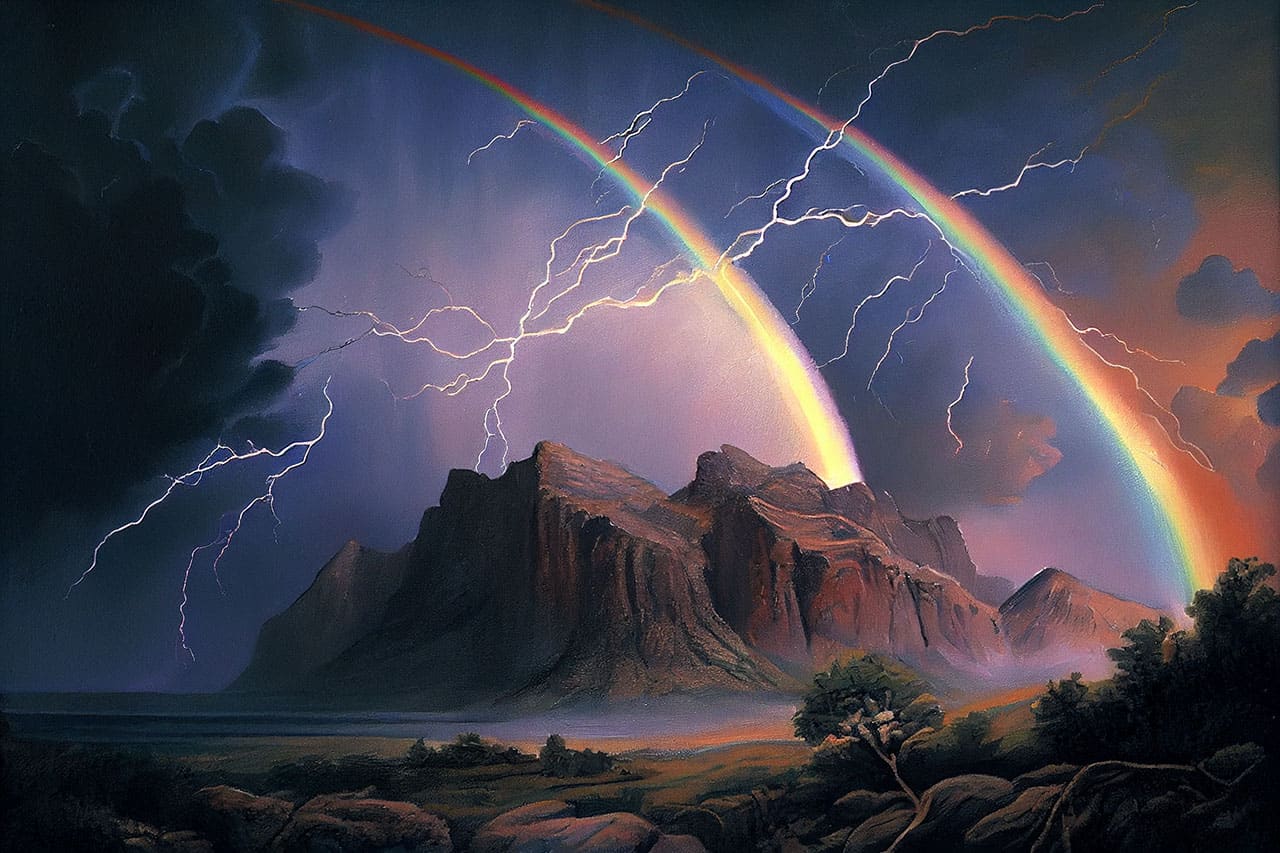 Double rainbow over a stormy mountain
